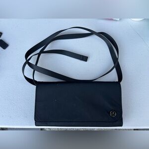 Lululemon purse, black, adjustable strap for shoulder or cross-body.